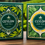 Ceylon Tea Packaging**

"Close-up shot of beautifully designed packaging for Ceylon tea, showcasing traditional Sri Lankan motifs. The packaging features elegant fonts in both English and Russian. Background: A lush tea plantation in the highlands. fully clothed, safe for work, appropriate content, professional product photography, high quality."

**
